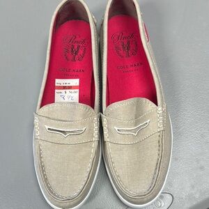8.5 like new Cole Haan Tan Loafers with White Trim